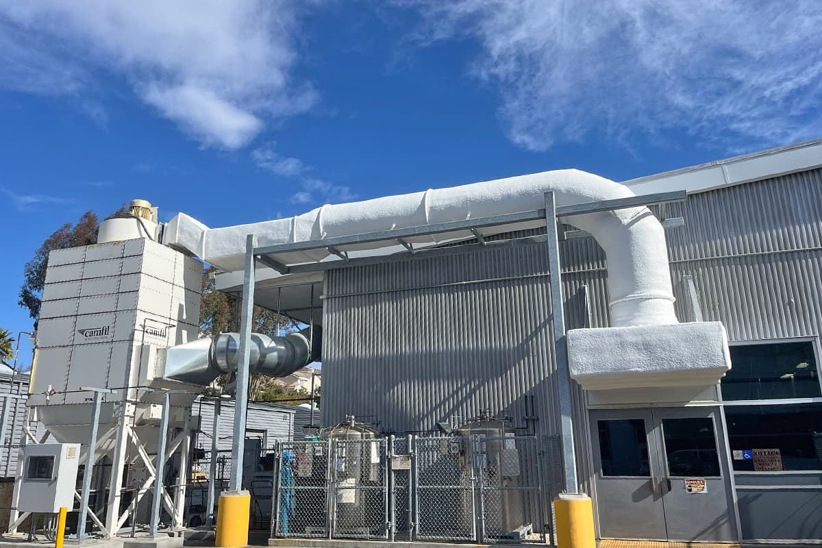 Close-up of spray foam encapsulated rooftop ductwork